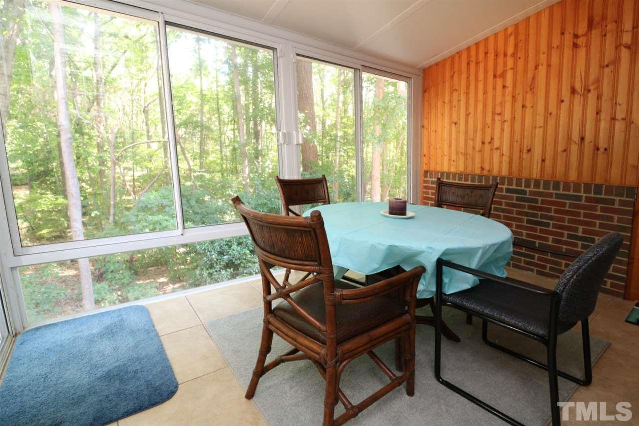 4703 Malone Court Raleigh, NC 27616 - Photo 14 of 30 a view of a dining room with furniture and a window