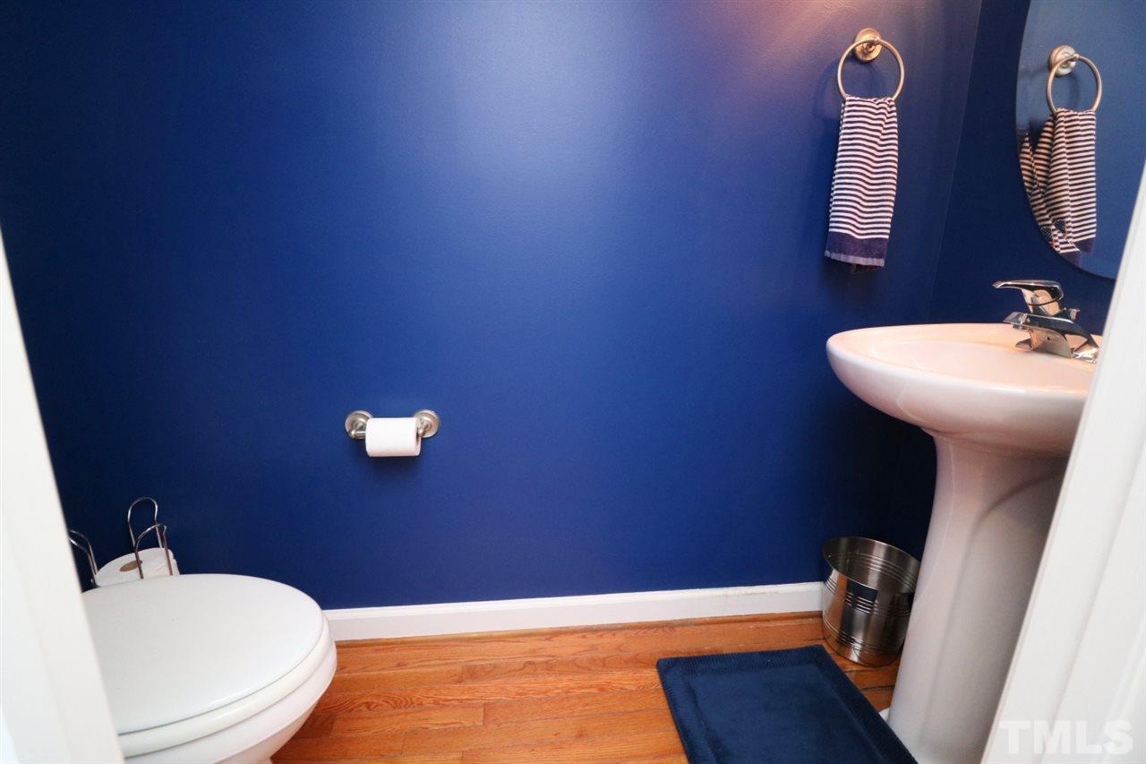 4703 Malone Court Raleigh, NC 27616 - Photo 15 of 30 a bathroom with a sink and a mirror