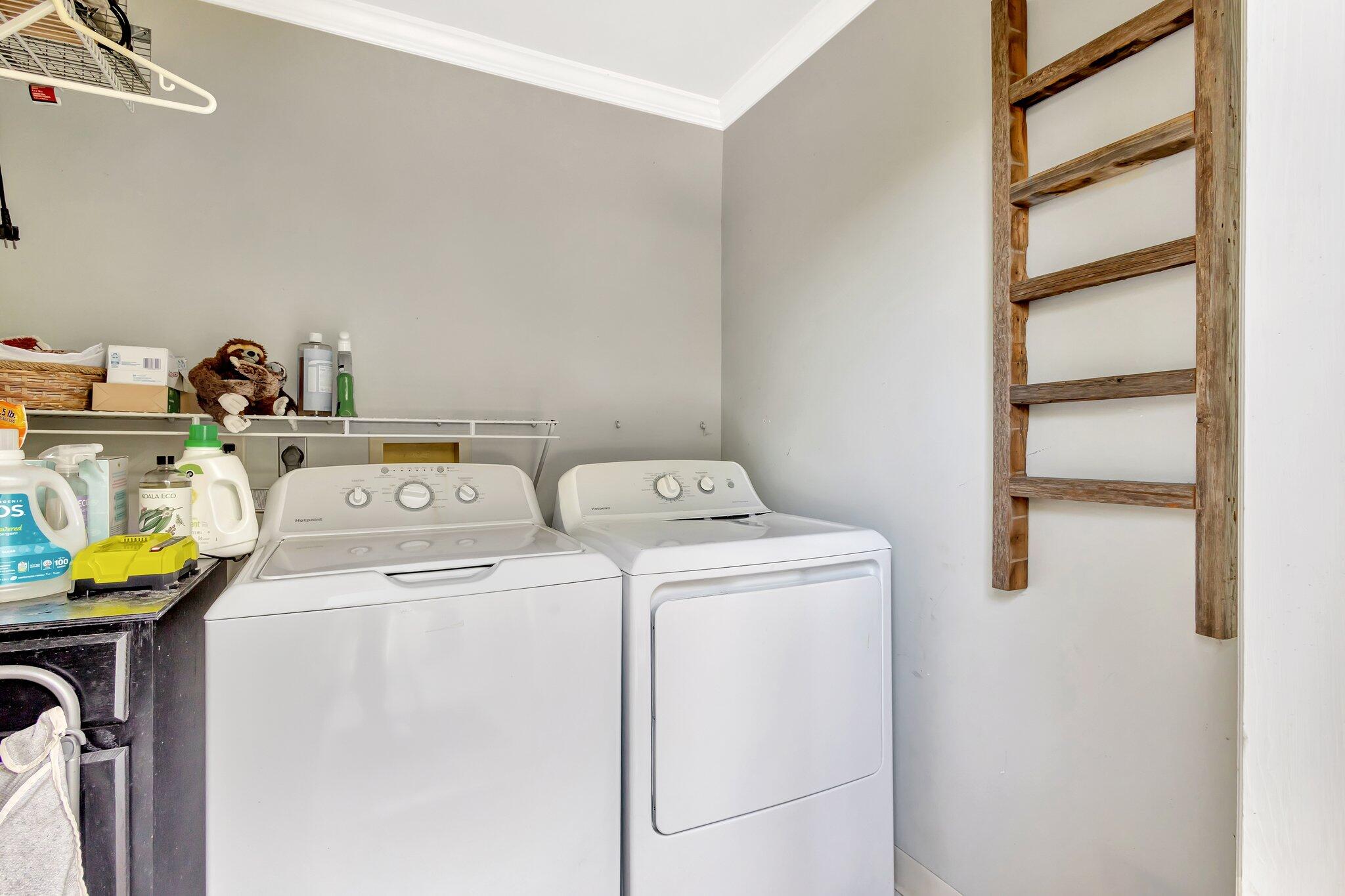 227 Northeast 12th Street, Unit 2 Delray Beach, FL 33444 - Photo 16 of 24 a utility room with dryer and washer