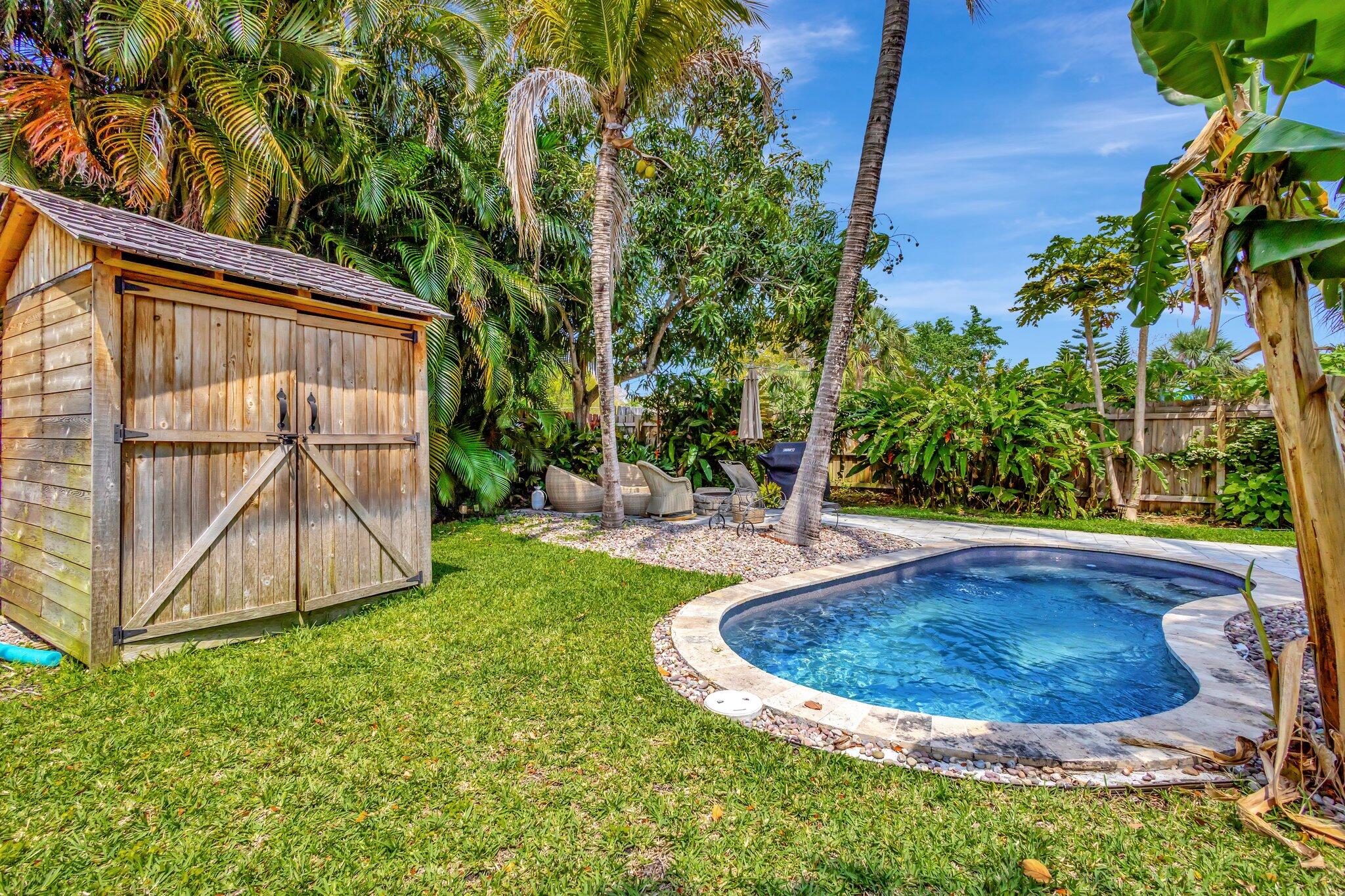 227 Northeast 12th Street, Unit 2 Delray Beach, FL 33444 - Photo 20 of 24 a view of a backyard