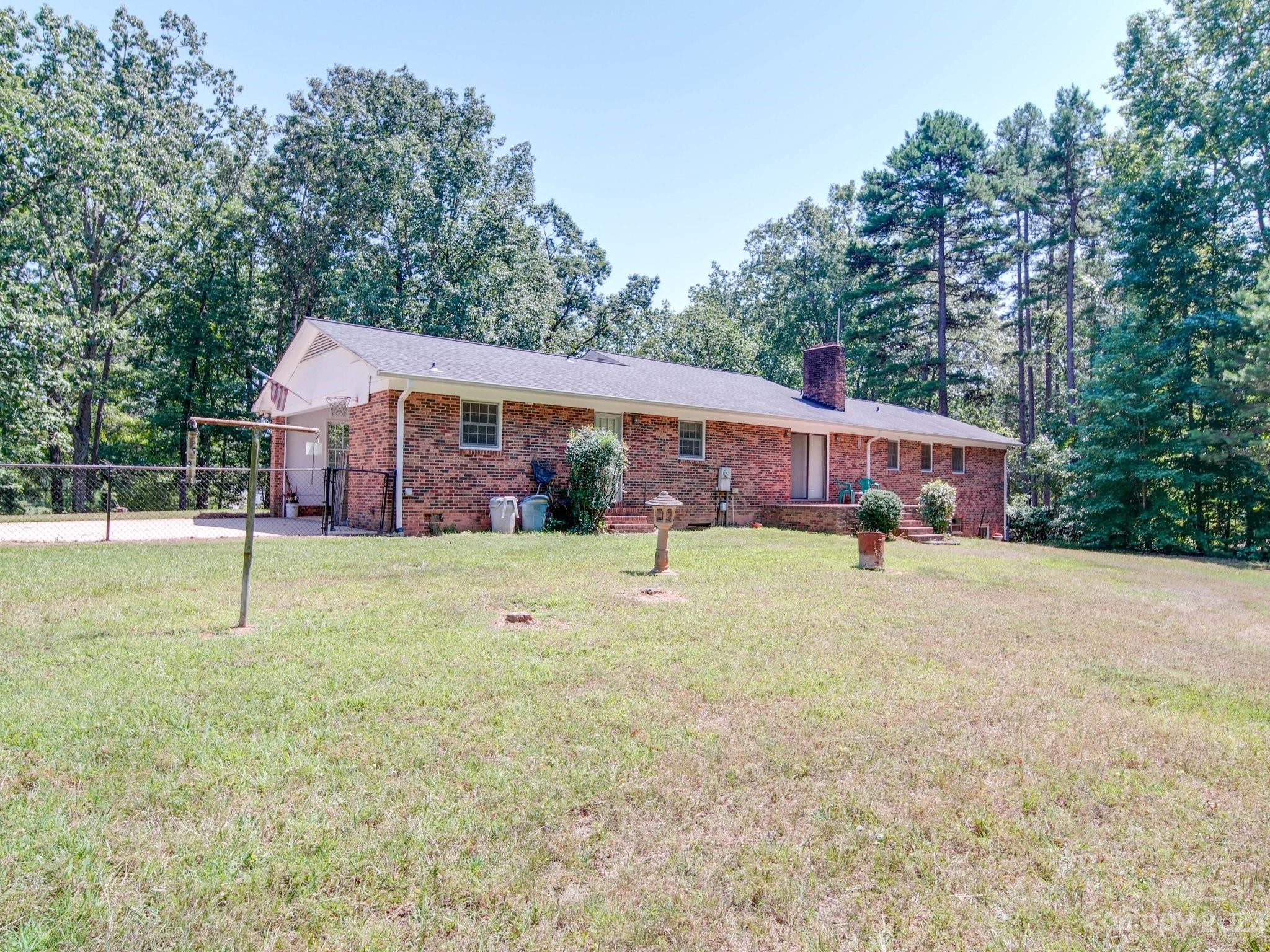 2845 Puetts Chapel Road Bessemer City, NC 28016 - Photo 13 of 15 a view of swimming pool with a backyard