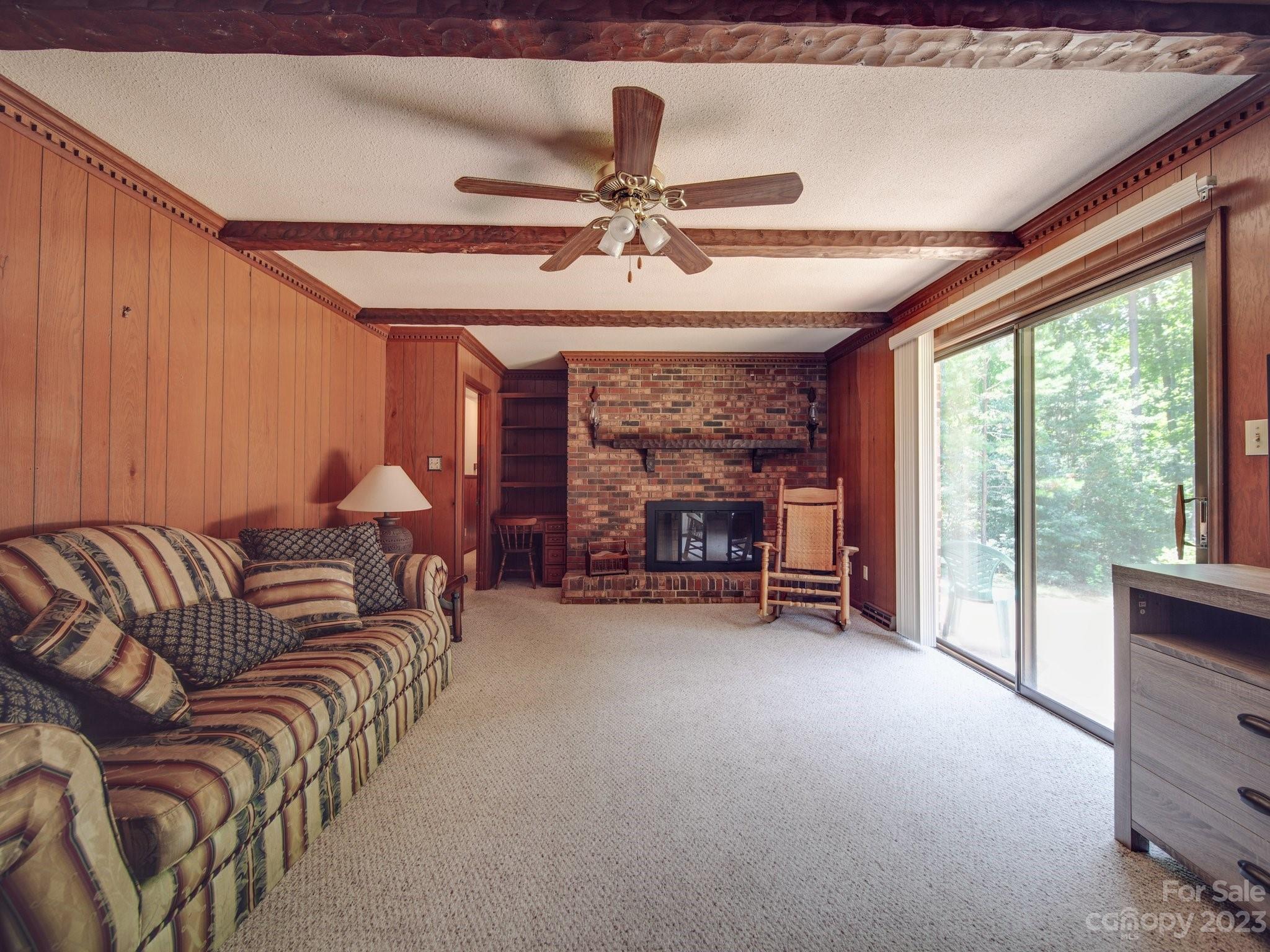 2845 Puetts Chapel Road Bessemer City, NC 28016 - Photo 3 of 15 a living room with furniture and a fireplace