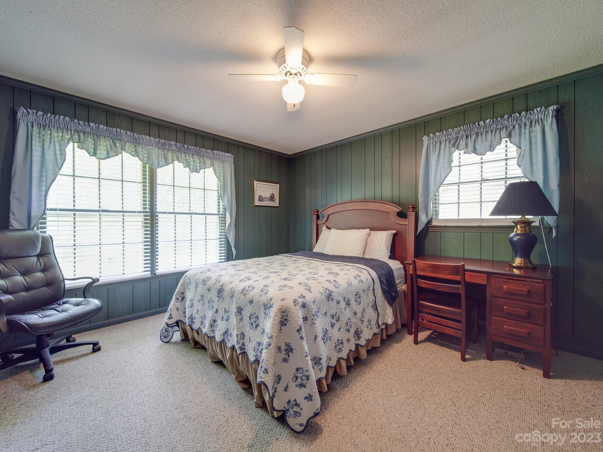 2845 Puetts Chapel Road Bessemer City, NC 28016 - Photo 7 of 15 a spacious bedroom with a bed and a dresser