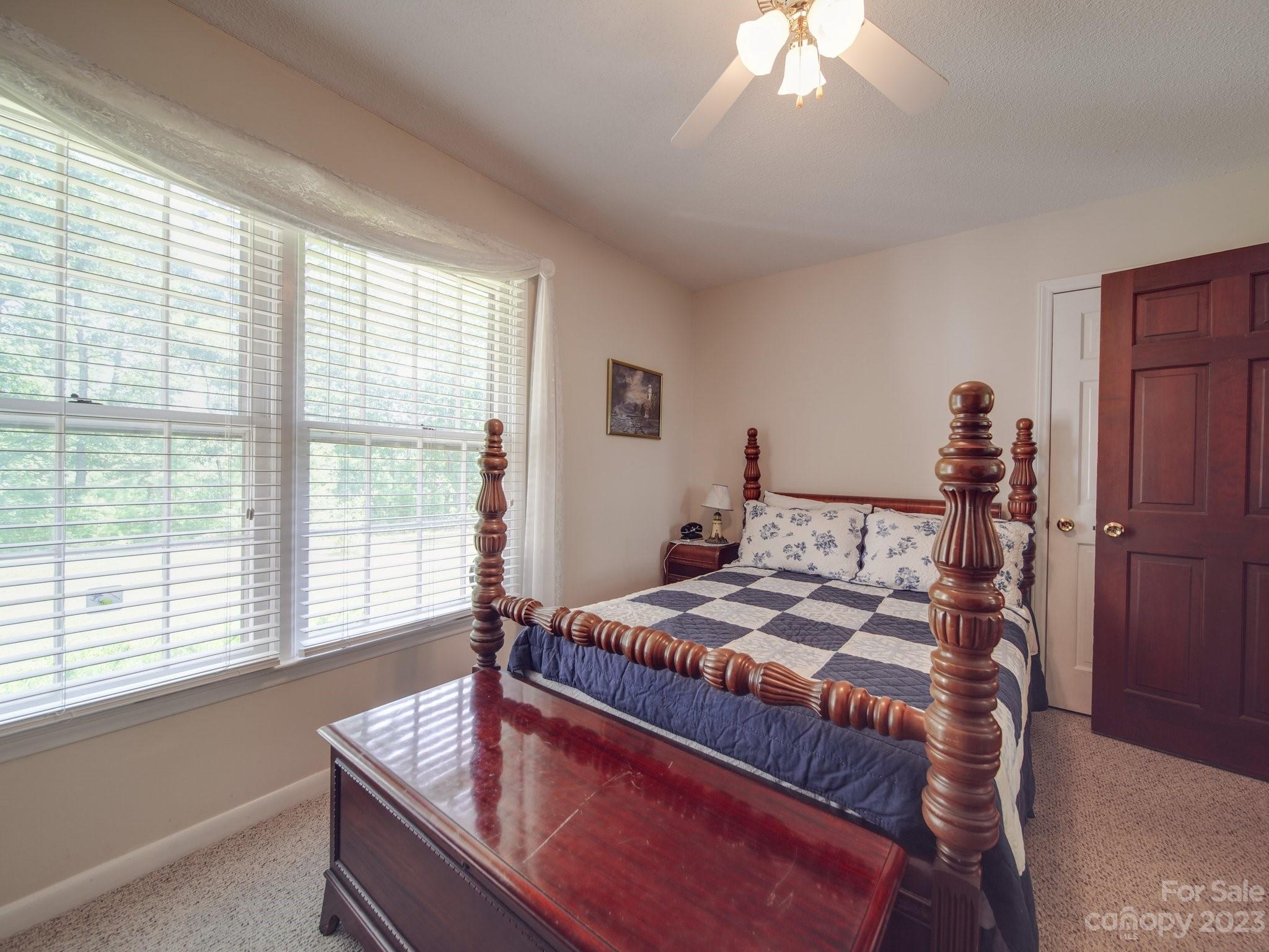2845 Puetts Chapel Road Bessemer City, NC 28016 - Photo 9 of 15 a bedroom with a bed and a window
