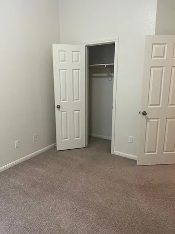 a view of a backyard with a small cabin