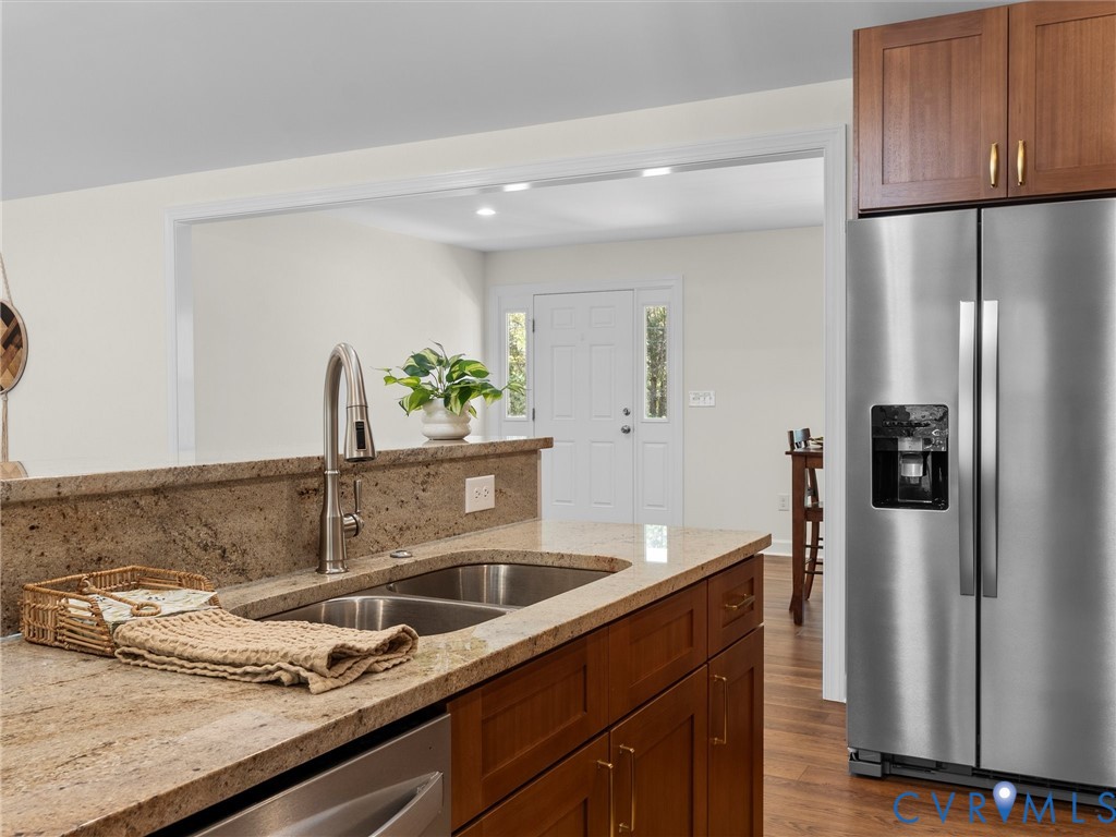 143 High School Road Buckingham, VA 23921 - Photo 17 of 50 a kitchen with stainless steel appliances granite countertop a refrigerator and a sink