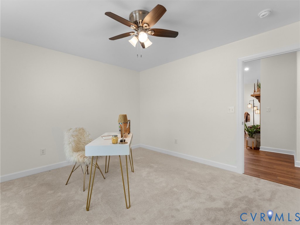 143 High School Road Buckingham, VA 23921 - Photo 36 of 50 a workspace with furniture and a chandelier