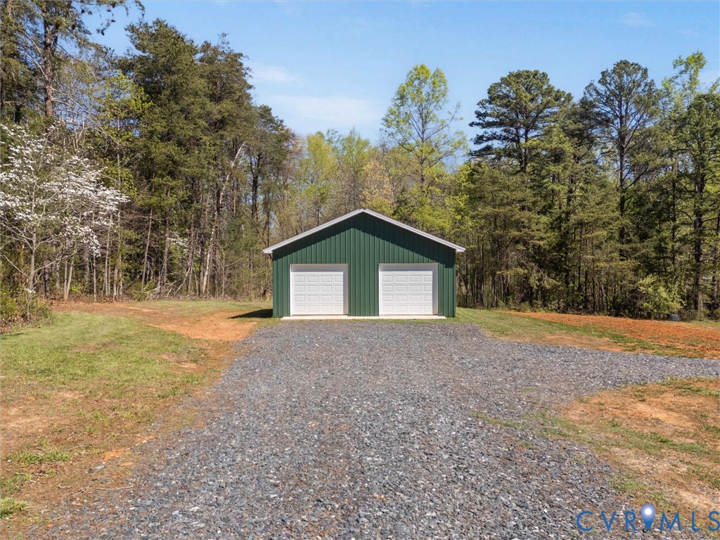 143 High School Road Buckingham, VA 23921 - Photo 48 of 50 a view of a house with a yard and large trees