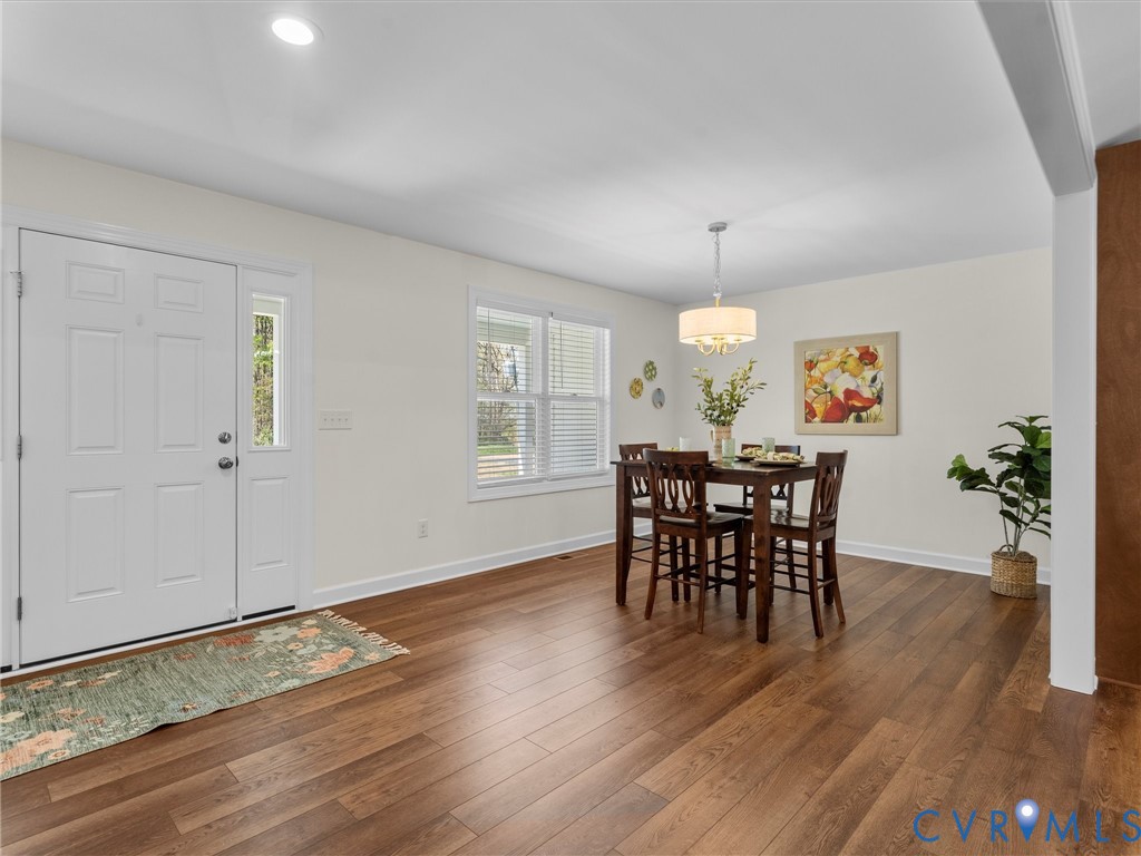 143 High School Road Buckingham, VA 23921 - Photo 8 of 50 a view of a dining room with furniture window and wooden floor