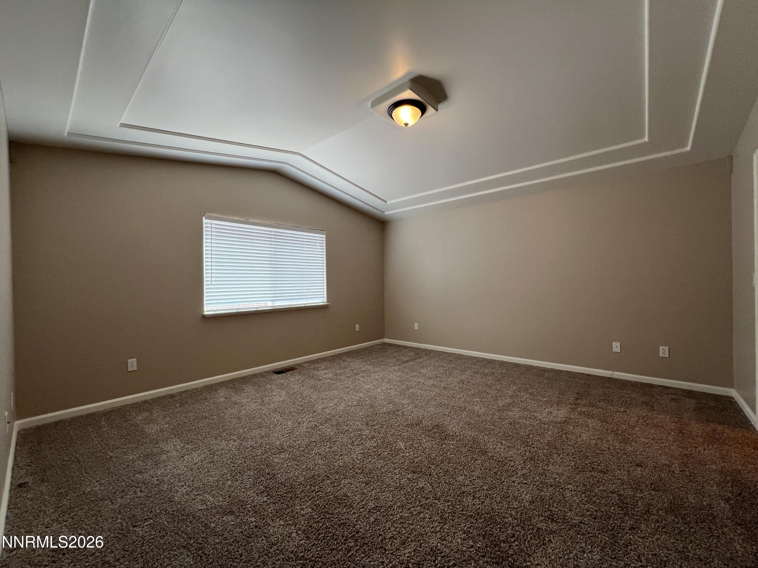 18406 Teddy Bear Court Reno, NV 89508 - Photo 13 of 44 an empty room with windows