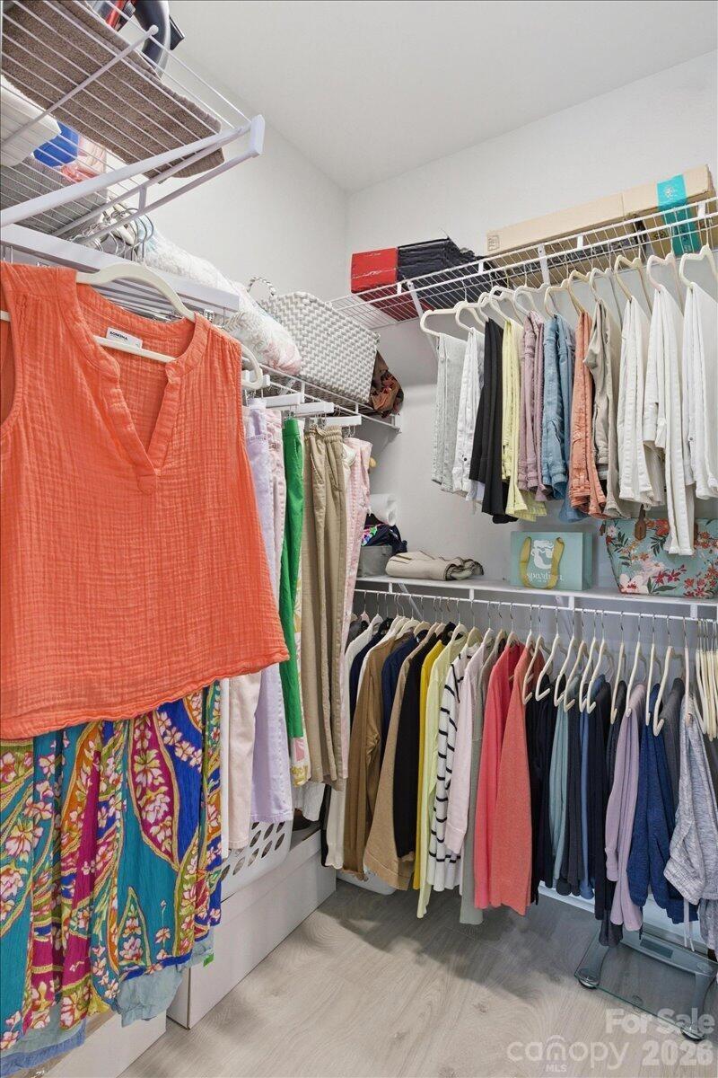 859 Ocean Hammock Loop Hardeeville, SC 29927 - Photo 19 of 33 a view of walk in closet with clothes