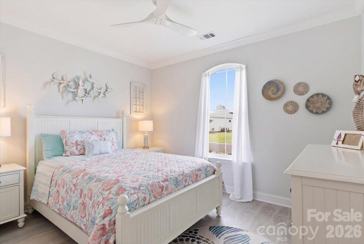 859 Ocean Hammock Loop Hardeeville, SC 29927 - Photo 20 of 33 a bedroom with a bed and a window