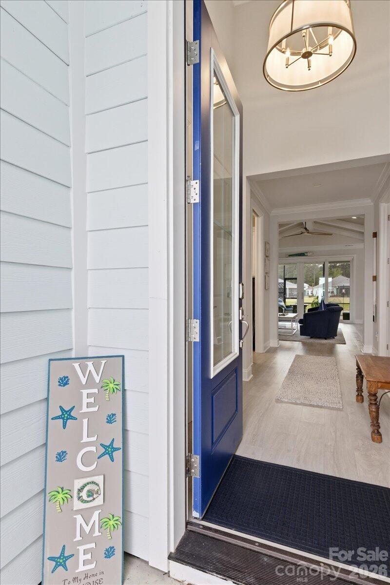859 Ocean Hammock Loop Hardeeville, SC 29927 - Photo 2 of 33 an entryway with a chandelier