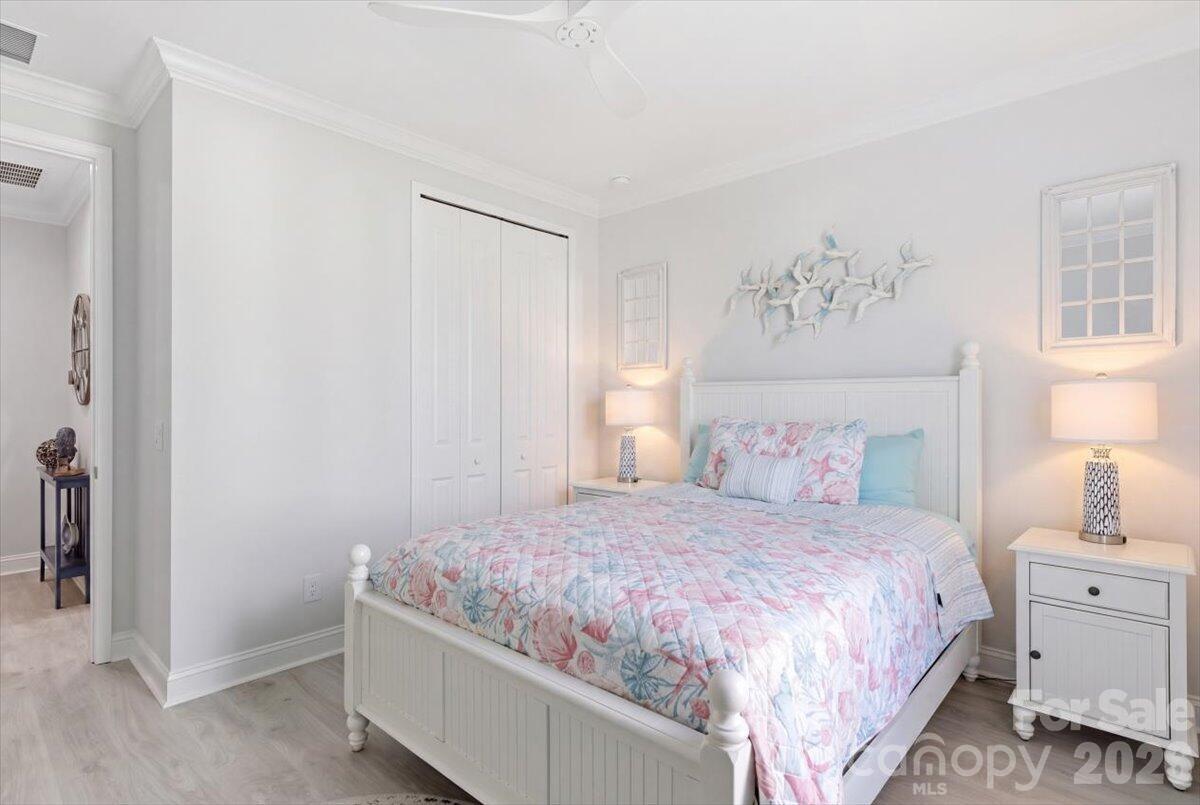 859 Ocean Hammock Loop Hardeeville, SC 29927 - Photo 21 of 33 a bedroom with a bed and a window