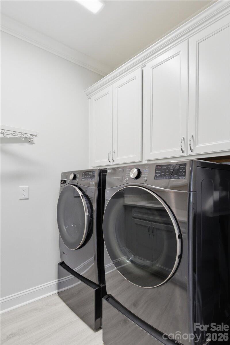 859 Ocean Hammock Loop Hardeeville, SC 29927 - Photo 26 of 33 a utility room with sink dryer and washer