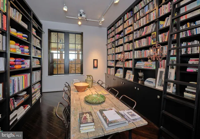 a view of a workspace with furniture