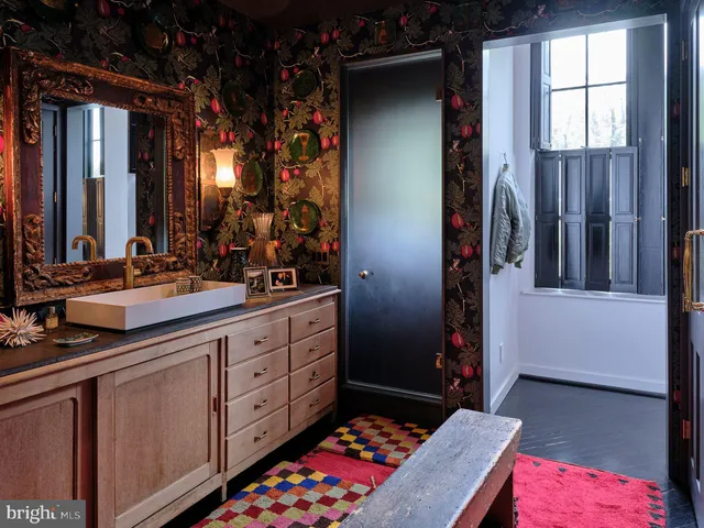 a living room with furniture fireplace and flat screen tv
