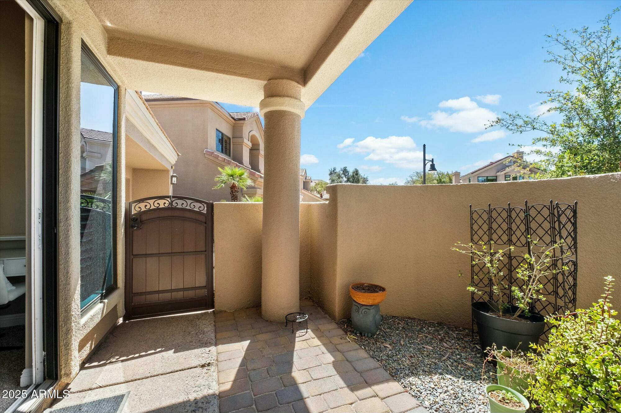 7525 East Gainey Ranch Road, Unit 130 Scottsdale, AZ 85258 - Photo 2 of 30 Courtyard off master bedroom