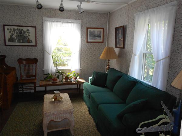 51 Main Road Westhampton, MA 01027 - Photo 11 of 29 a living room with furniture and a large window