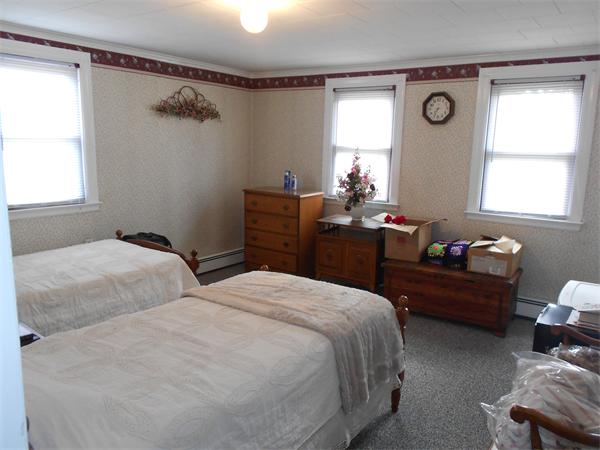51 Main Road Westhampton, MA 01027 - Photo 19 of 29 a bedroom with two beds and a window