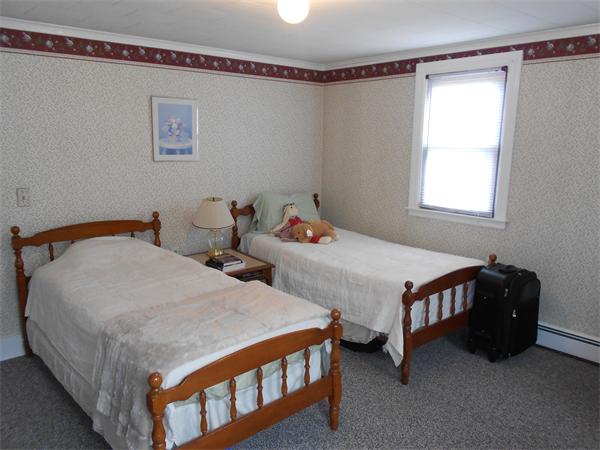 51 Main Road Westhampton, MA 01027 - Photo 20 of 29 a bedroom with two beds and a window