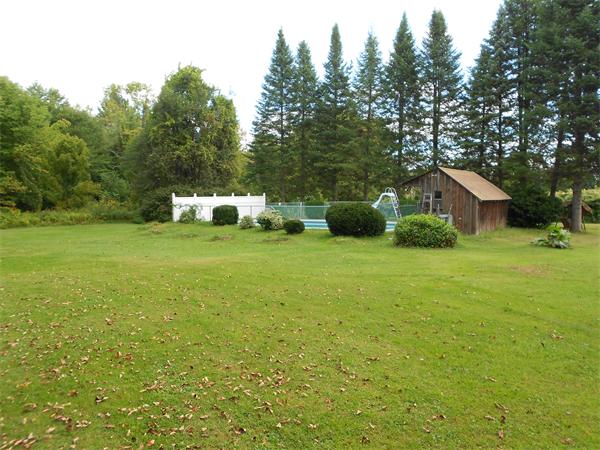 51 Main Road Westhampton, MA 01027 - Photo 24 of 29 a view of a house with yard and green space