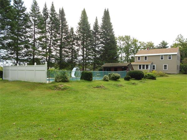 51 Main Road Westhampton, MA 01027 - Photo 25 of 29 a front view of a house with garden