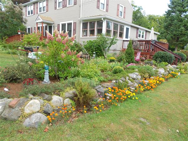 51 Main Road Westhampton, MA 01027 - Photo 29 of 29 a view of a house with a yard and garden