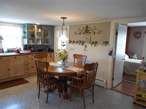 51 Main Road Westhampton, MA 01027 - Photo 5 of 29 a view of a dining room with furniture