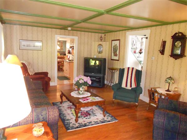 51 Main Road Westhampton, MA 01027 - Photo 9 of 29 a living room with furniture and a table