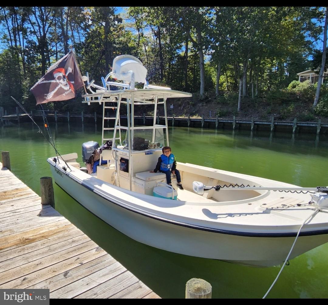 0 Sandy Beach Road Heathsville, VA 22473 - Photo 4 of 10 a view of a house with a lake view and a wooden floor