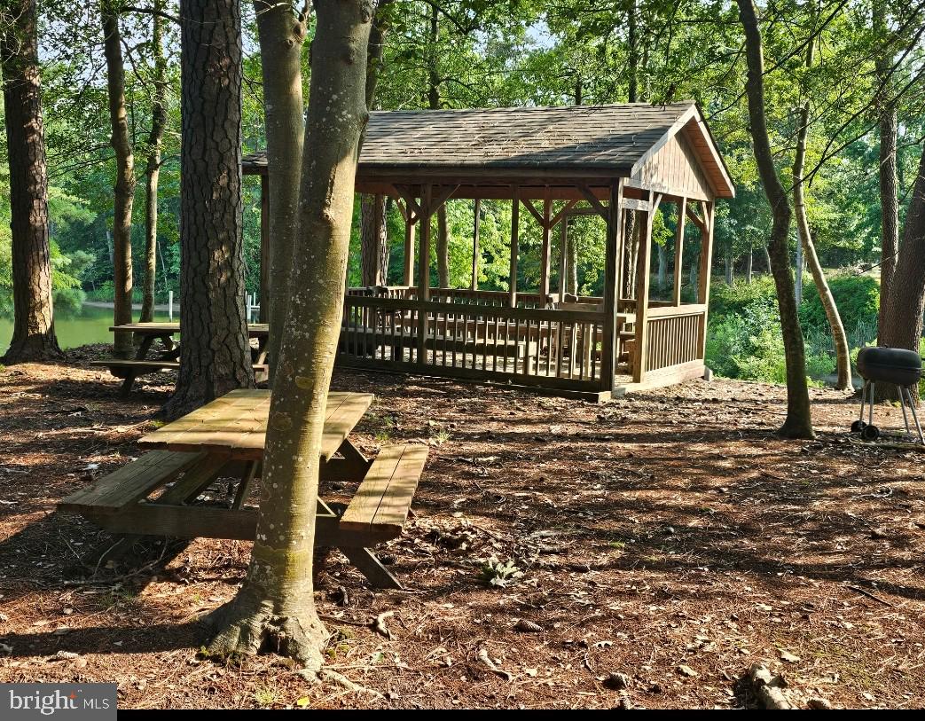 0 Sandy Beach Road Heathsville, VA 22473 - Photo 6 of 10 a back yard of a house with a large tree