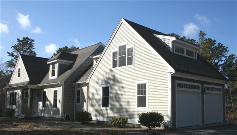 150 Blue Heron Road Wellfleet, MA 02667 - Photo 1 of 35 a view of a house with a balcony