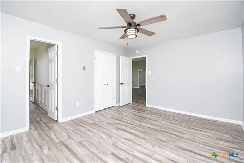 a view of a livingroom with wooden floor