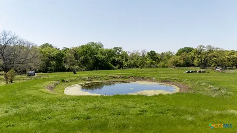 a view of a garden and basketball court
