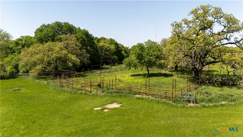 a view of a golf course with a lake