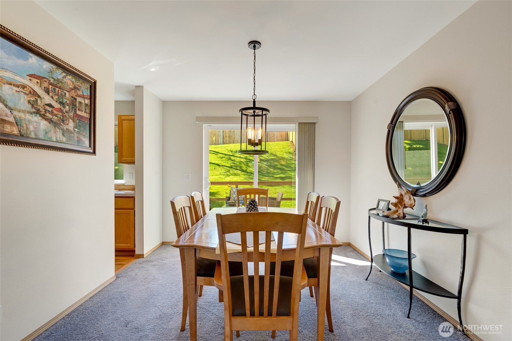 14 60th Place Southeast Everett, WA 98203 - Photo 14 of 35 a dining room with furniture a chandelier and wooden floor