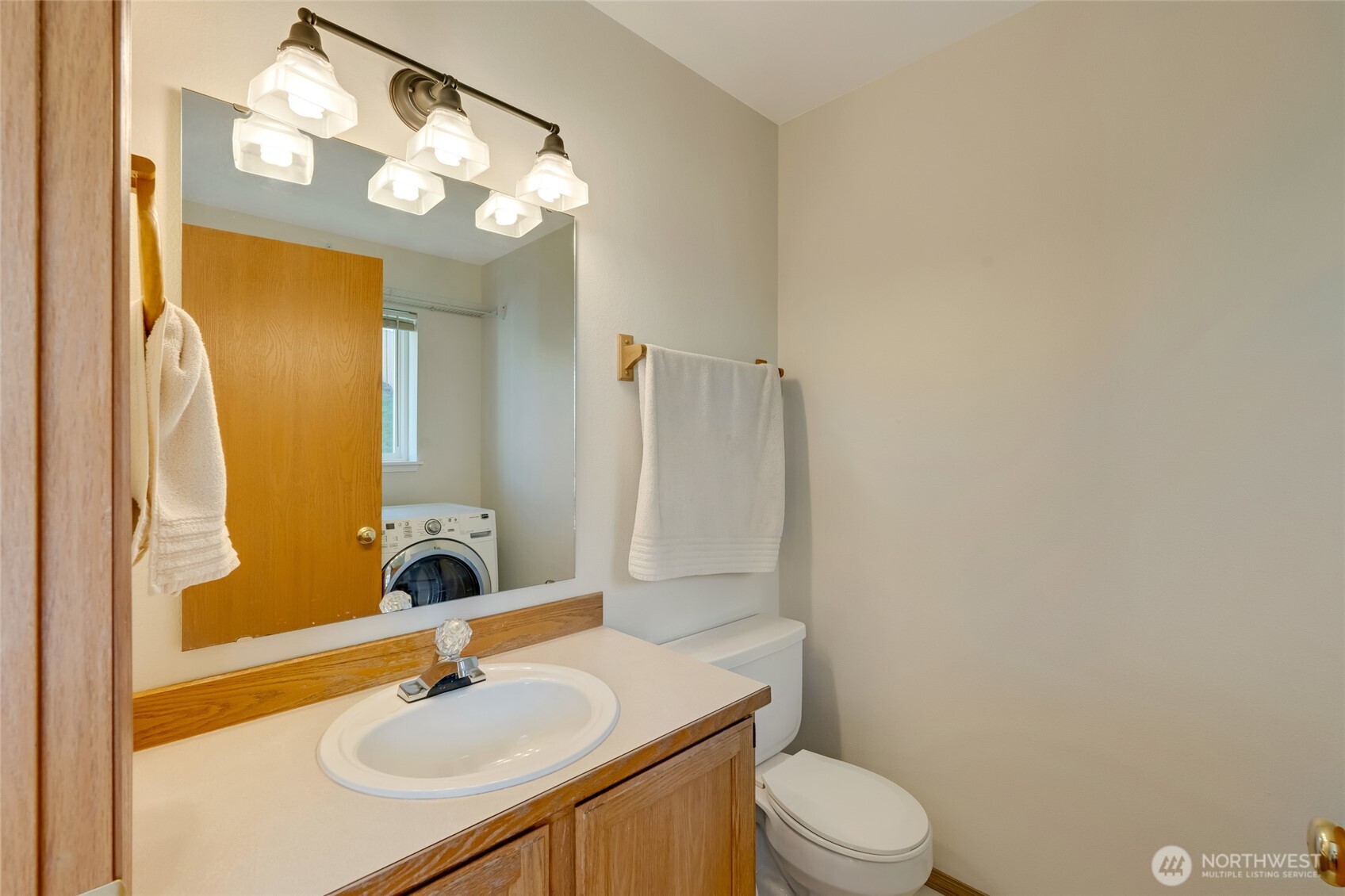 14 60th Place Southeast Everett, WA 98203 - Photo 15 of 35 a bathroom with a sink a toilet and a mirror