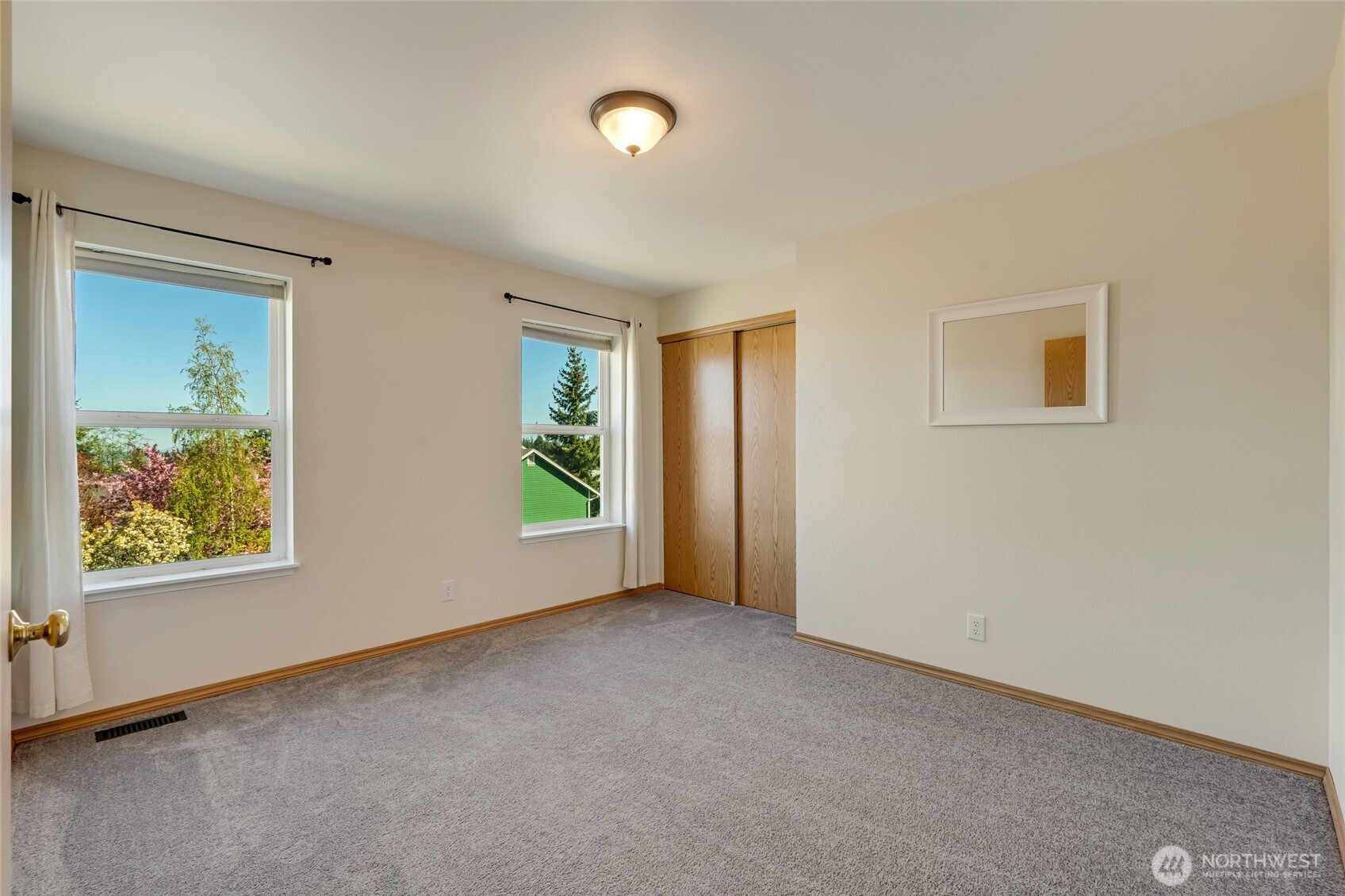 14 60th Place Southeast Everett, WA 98203 - Photo 23 of 35 an empty room with windows and closet