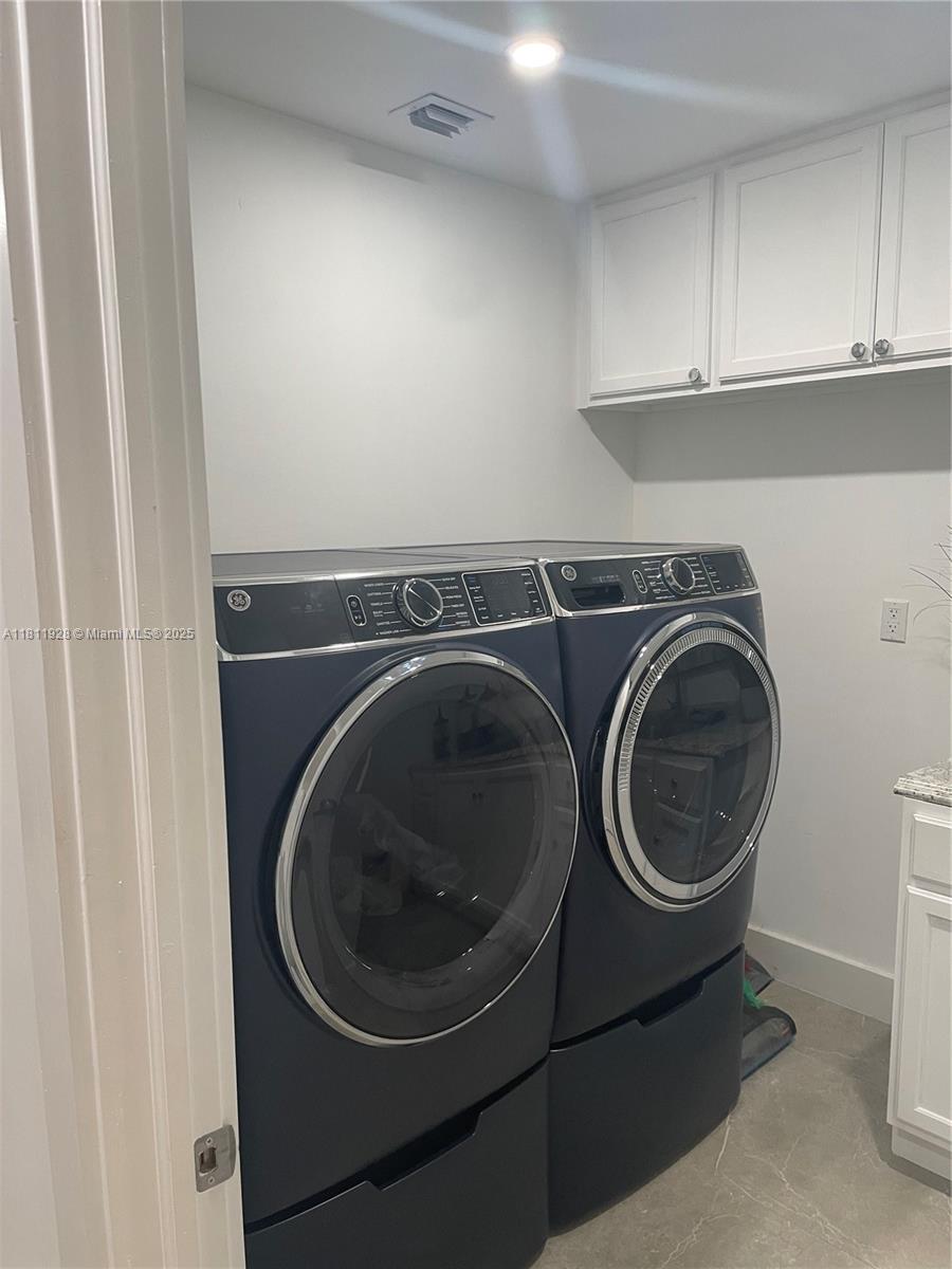 19700 Southwest 184th Street Miami, FL 33187 - Photo 13 of 52 a utility room with sink dryer and washer