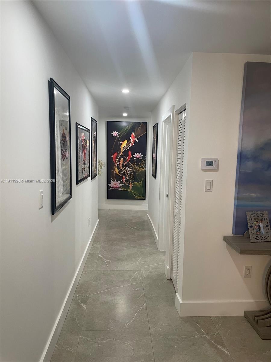 19700 Southwest 184th Street Miami, FL 33187 - Photo 14 of 52 a view of a hallway with closet