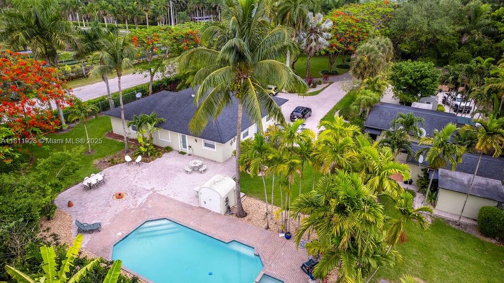 19700 Southwest 184th Street Miami, FL 33187 - Photo 35 of 52 an aerial view of a house with a yard and garden