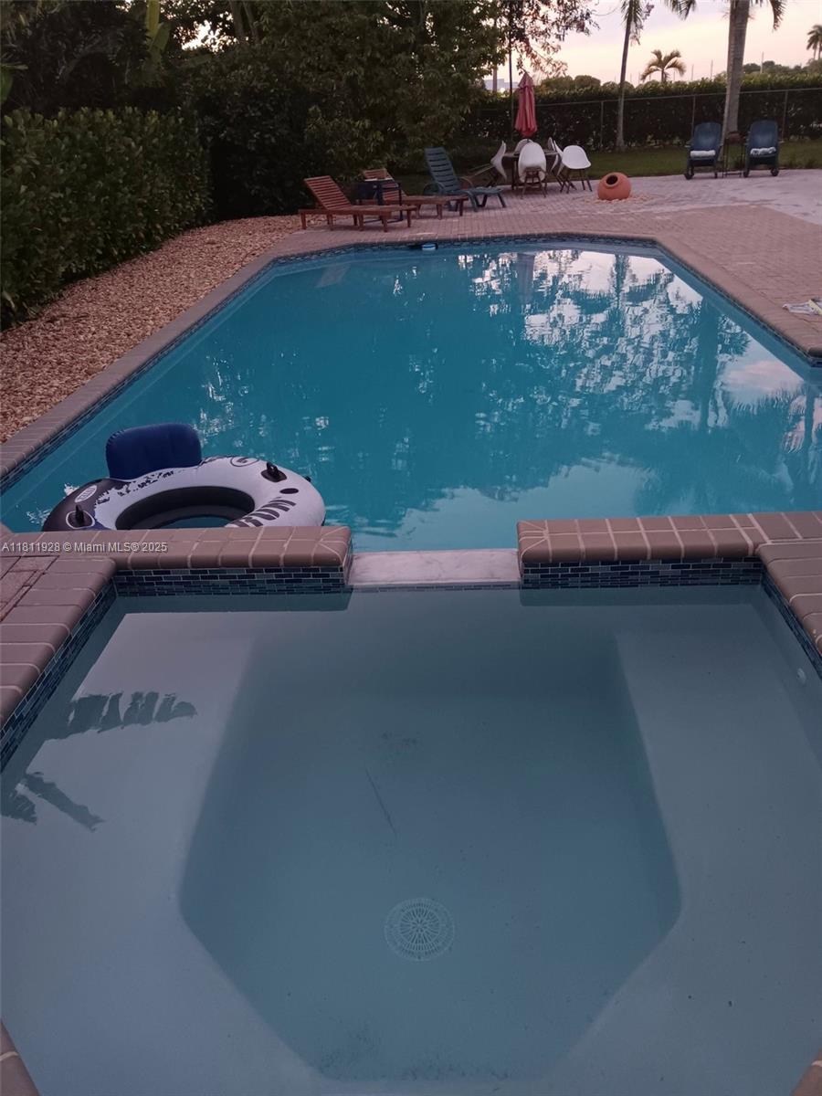 19700 Southwest 184th Street Miami, FL 33187 - Photo 36 of 52 a view of outdoor space with garden view