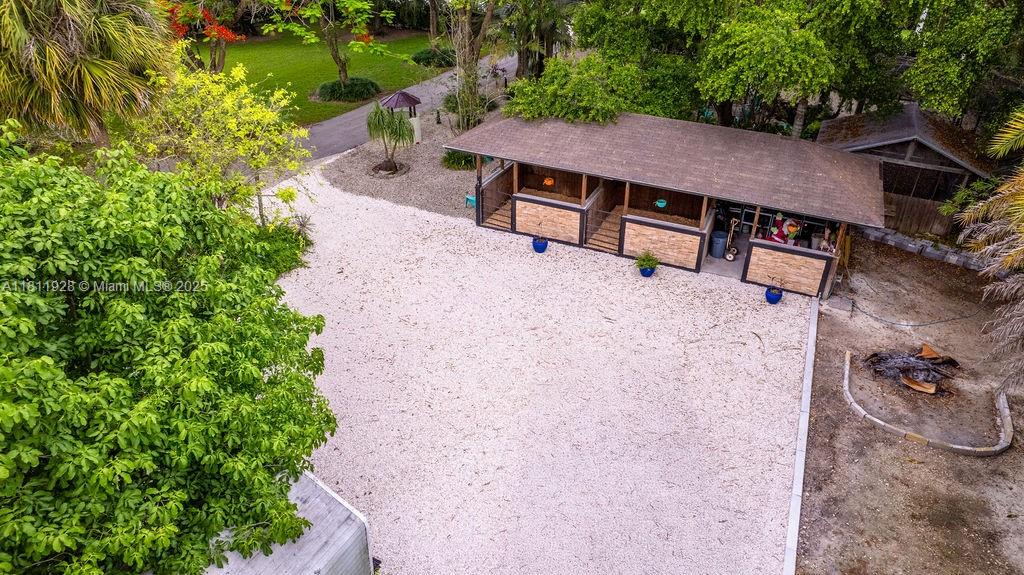 19700 Southwest 184th Street Miami, FL 33187 - Photo 39 of 52 an aerial view of a house with yard and patio