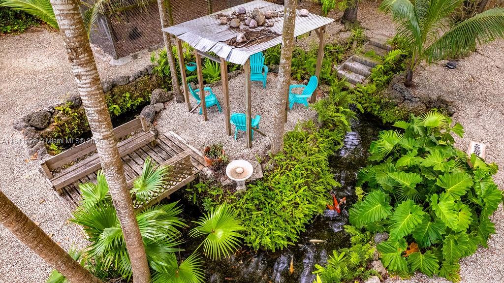 19700 Southwest 184th Street Miami, FL 33187 - Photo 45 of 52 an aerial view of a house with a yard and garden