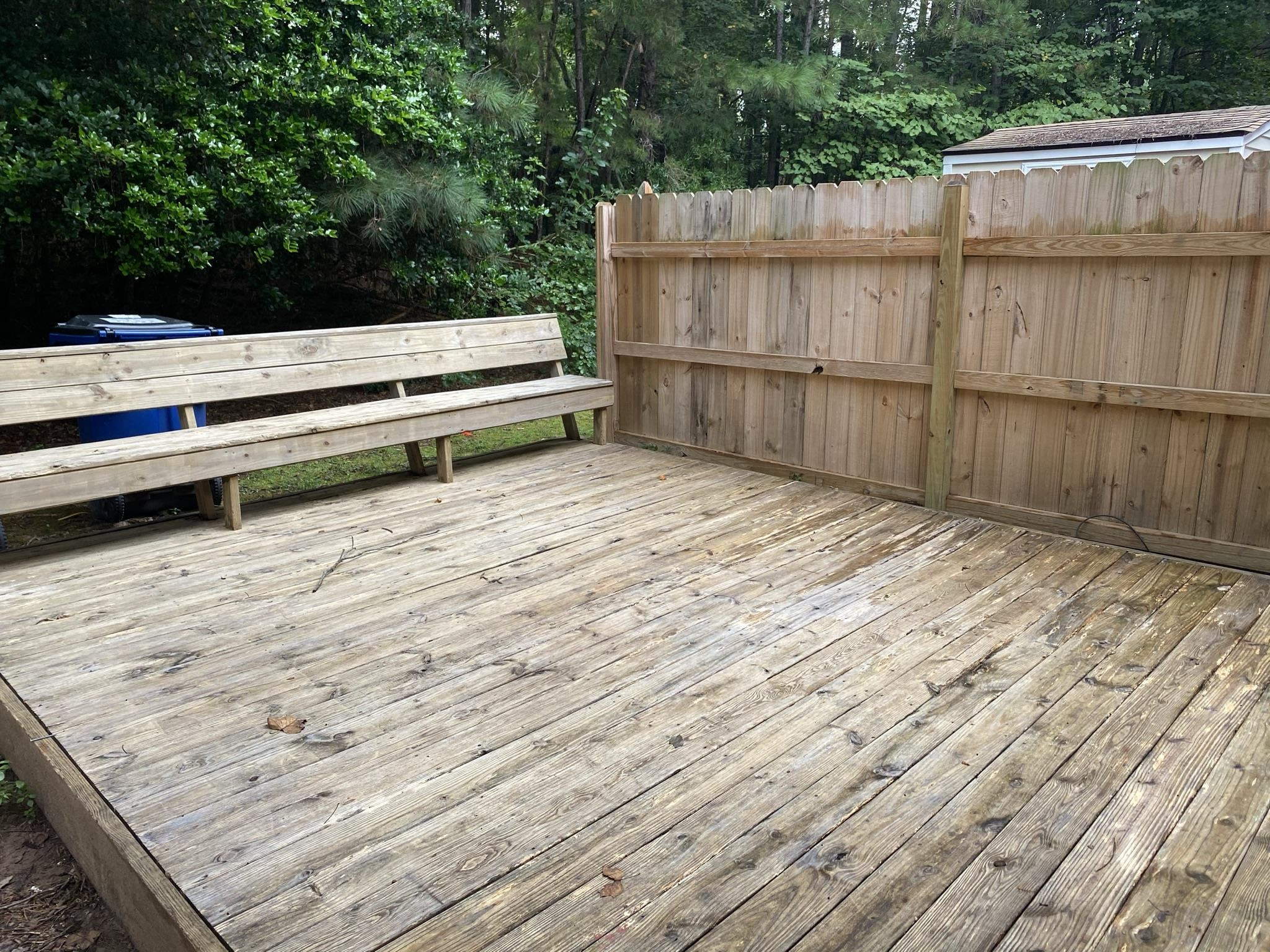 7717 Bernadette Lane Raleigh, NC 27615 - Photo 13 of 26 a view of backyard and wooden floor