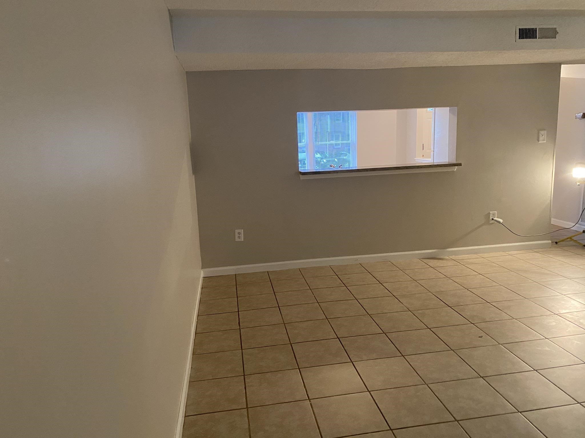 7717 Bernadette Lane Raleigh, NC 27615 - Photo 10 of 26 a view of an empty room