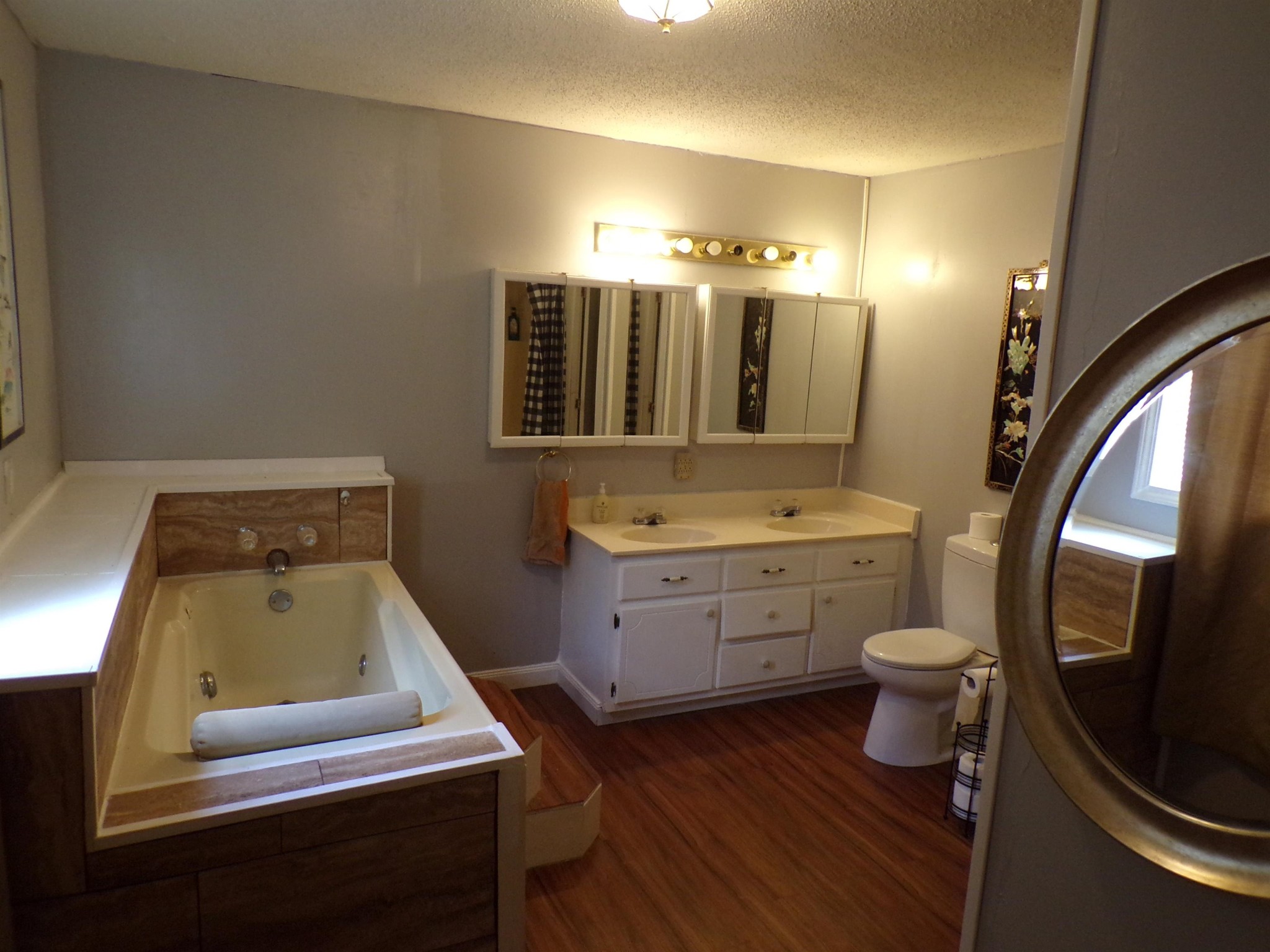 75 Friends Road Potts Camp, MS 38659 - Photo 18 of 28 a bathroom with a toilet sink and mirror