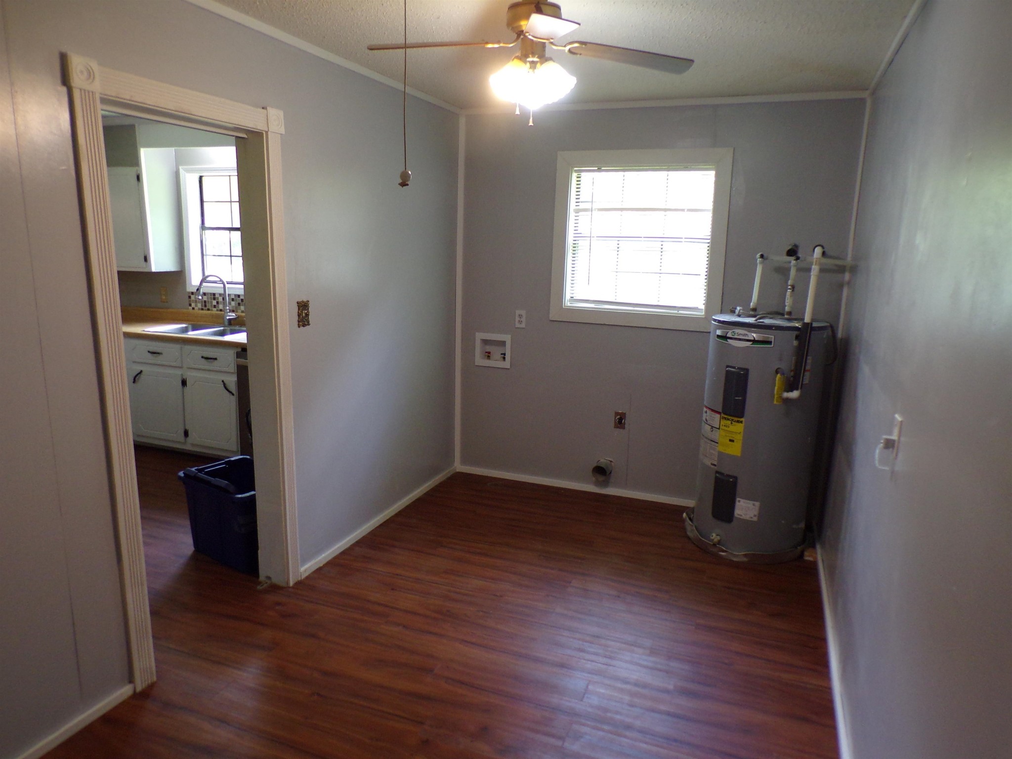 75 Friends Road Potts Camp, MS 38659 - Photo 20 of 28 an empty room with wooden floor closet and windows