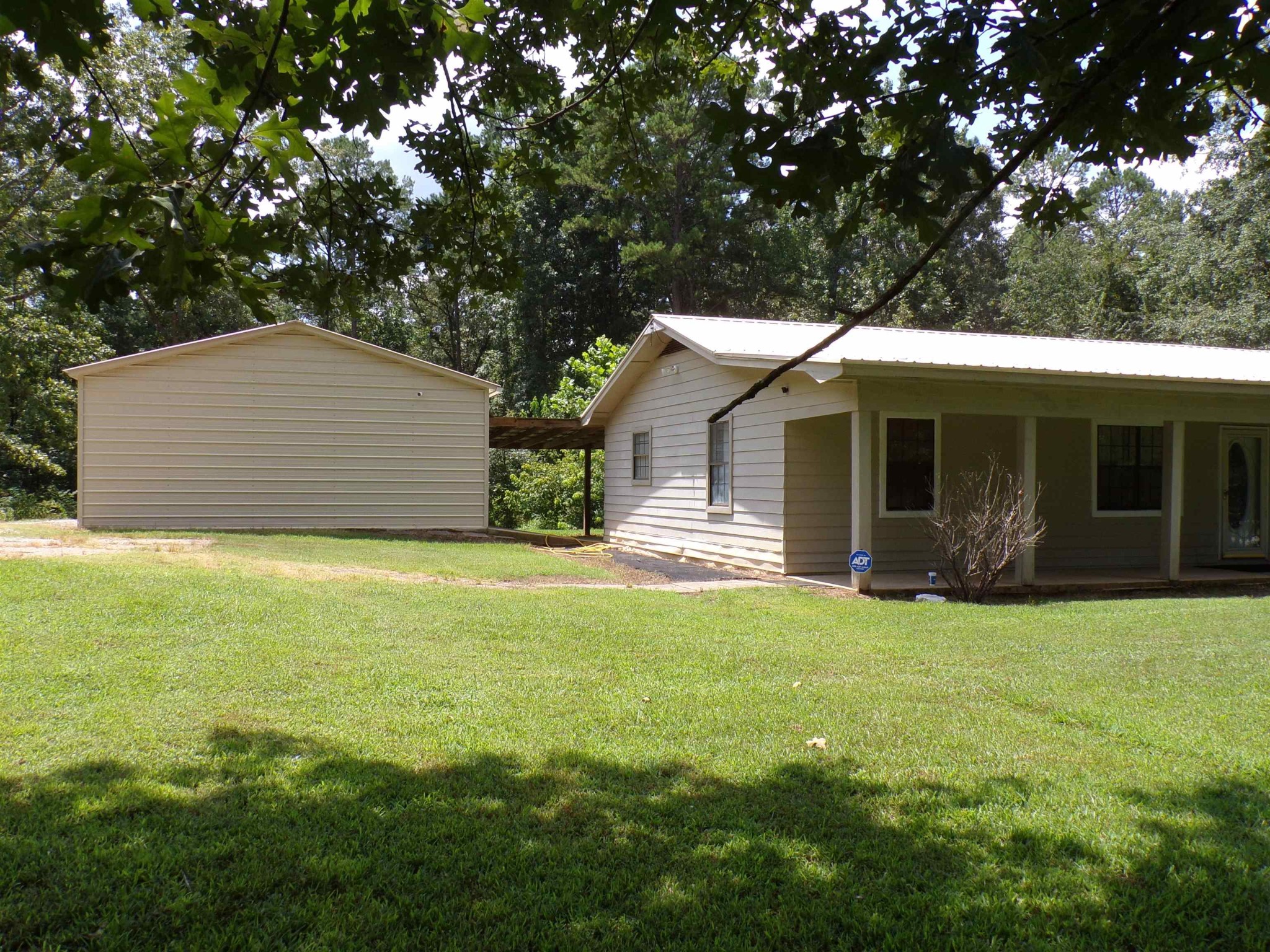 75 Friends Road Potts Camp, MS 38659 - Photo 2 of 28 a front view of house with yard and green space
